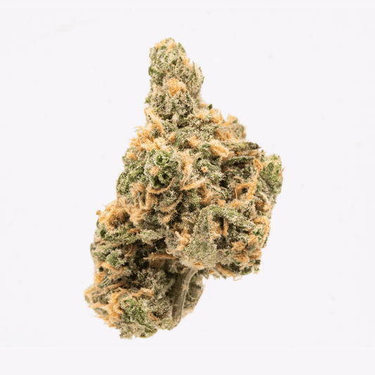 Single Blue Dream cannabis bud with a dense, trichome-coated structure on a white background.