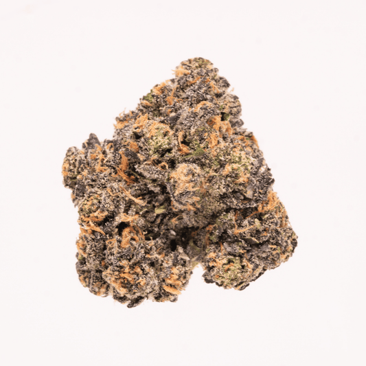 Close-up of a cannabis bud with orange pistils, frosty trichomes, and dark purple hues.