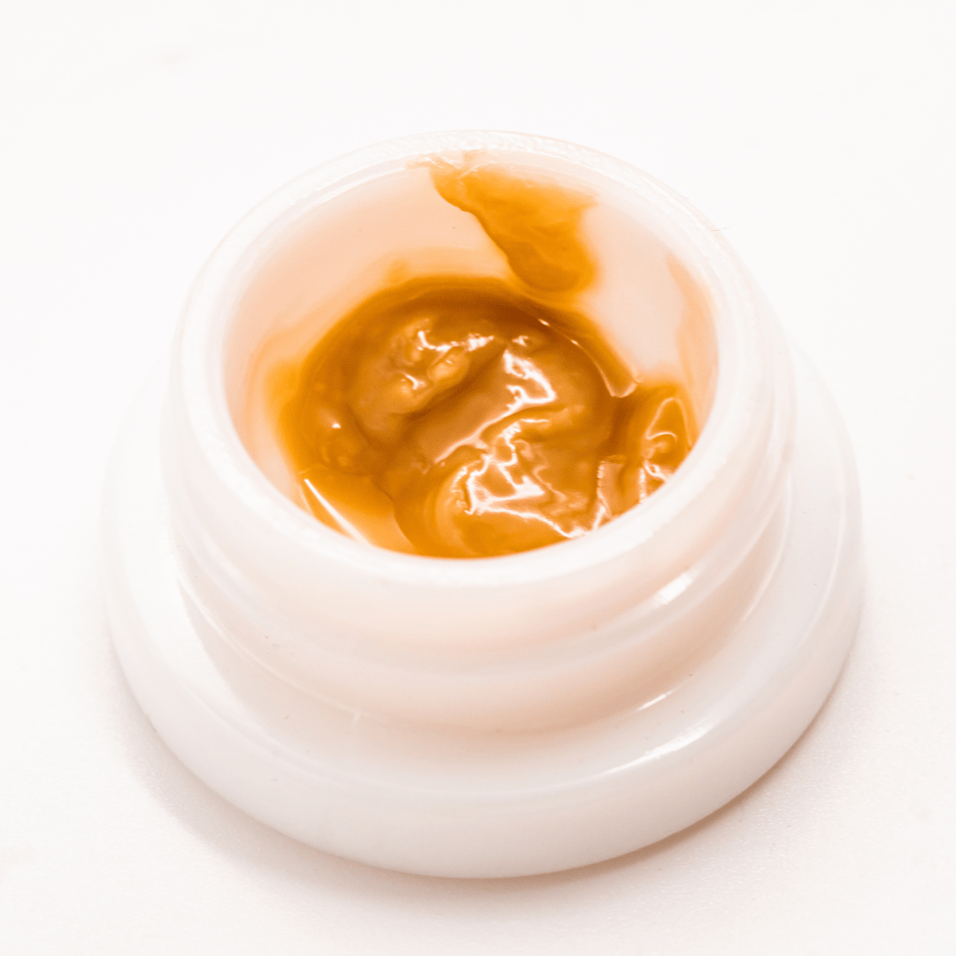 Skoranges THCA solventless live rosin dabs, providing a rich and consistent texture with potent aromatic compounds.