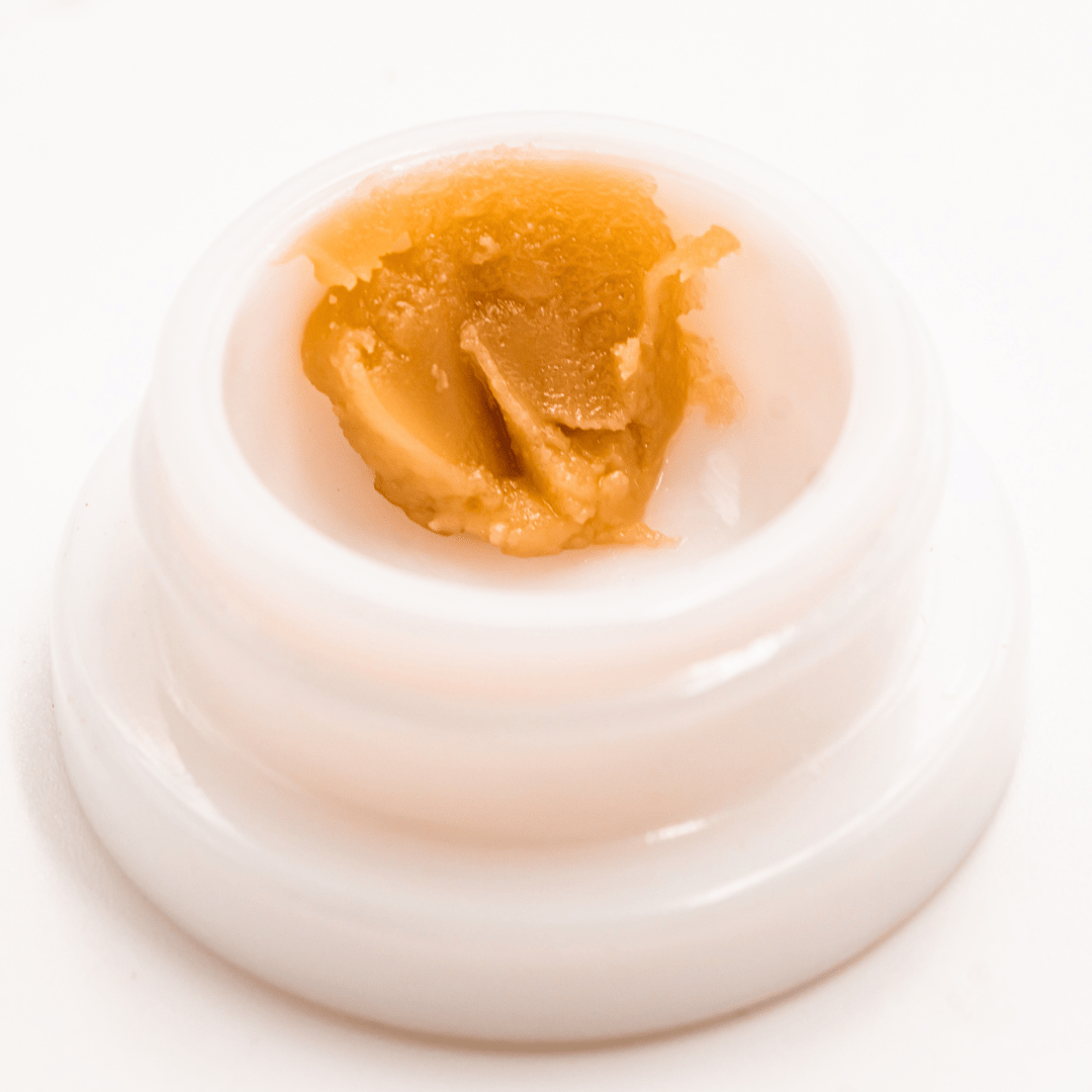 Tropicana Cookies THCA solventless live rosin dabs, golden in color and rich in aromatic terpenes.