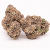  A small cluster of Zerbert THCa buds, emphasizing their frosty exterior and compact appearance.