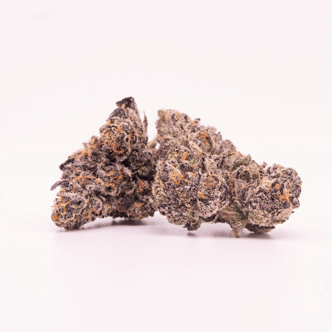 Cluster of Headbanger THCa flower buds arranged together.